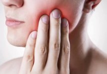 Что делать, если болит зуб и отдает в ухо
